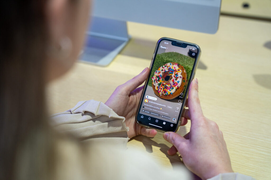 Girl scrolling her social media feed trying to engage with a trendjacking post